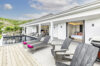 Elegant St Barts villa with poolside deck, sun loungers, and open bedrooms blending indoor comfort with outdoor Caribbean living.