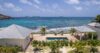 Beachfront St Barts villa rental with private pool, tropical garden, and panoramic ocean views