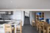 Modern kitchen and dining area in St Barts luxury rentals with minimalist design