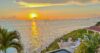 Private St Barts villa terrace with infinity pool facing Caribbean sunset