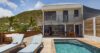 Private pool deck with loungers and sea view at a St Barts vacation rental