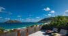Private sun deck with loungers and panoramic sea views at a St Barts villa rental
