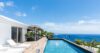Private pool with ocean panorama and sun loungers on deck at St Barthelemy vacation rental