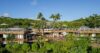 Aerial view of luxury villa with wooden terraces and tropical gardens in St Barts rental