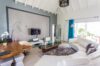 Stylish living room in St Barts villas with vaulted ceiling and contemporary decor