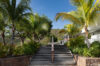 Villa surrounded by beautiful natural scenery, with lush greenery, trees, and a peaceful landscape all around
