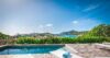 Infinity pool with wooden deck and panoramic Caribbean Sea views at luxury villa rental in St Barts