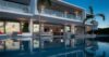 Modern luxury villa with illuminated pool and terraces in St Barts vacation rental