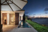 Evening terrace with narrow pool and ocean view at private villa rental in St Barts