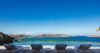 Infinity pool at St Barts villa with sun loungers facing panoramic ocean views