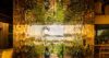Artistic villa passage in St Barts with mirrored walls framing ocean and garden views