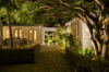Charming St Barts villa built into a stone tower with terrace overlooking turquoise waters.