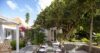 Private villa terrace in St Barts with serene poolside setting and panoramic coastal vistas.