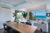 Contemporary dining and living area with ocean views at luxury St Barts villa rental