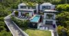 Luxury hillside villa in St Barts with modern architecture, infinity pool, and tropical gardens.