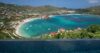 Infinity pool overlooking Gustavia Bay in St Barts with sweeping views of turquoise water and hillside homes.