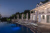 Evening view of illuminated pool and terrace at Villa Plumbago, Colombier, St Barthelemy vacation rentals
