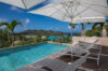 Pool with sun loungers and panoramic bay view at Villa Plumbago, Colombier, St Barthelemy vacation rental