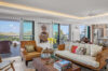 Stylish living room with art accents and terrace view at Villa Plumbago, Colombier, St Barts villa rentals