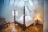 Bright St Barts villa bedroom with modern furnishings and sweeping Caribbean horizon.