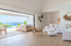 Spacious villa living area in St Barts with modern design, high ceilings, and ocean views.