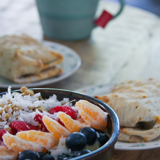 Fresh fruit breakfast bowl with crepes