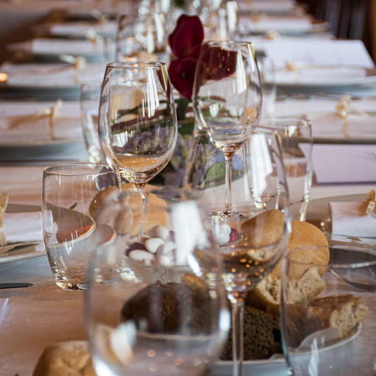Elegant dining table set with wine glasses