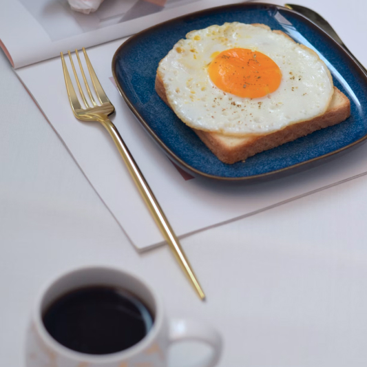 Egg toast breakfast with coffee.