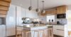 Modern kitchen with island seating and pendant lighting at a St Barts luxury villa rental