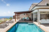 Private pool with sun loungers and shaded lounge at a St Barts luxury villa rental.
