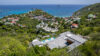 Aerial view of a hillside St Barts villa with infinity pool and panoramic ocean views