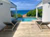 Private plunge pool and sun loungers overlooking the Caribbean Sea at a luxury villa rental in St Barthélemy.