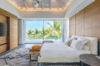 Bright bedroom with pool and palm view at a contemporary St Barts villa rental