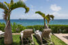 Seaside loungers under palm trees at Villa Plumbago, Colombier, St Barthelemy vacation rentals