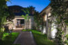 Evening garden pathway leading to outdoor dining area at Villa Plumbago, Colombier, St Barts villa rentals.