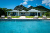 Front view of Villa Plumbago with pool and mountain backdrop, Colombier, St Barts villa rentals