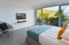 Bright bedroom with ocean-view terrace at Villa Plumbago, Colombier, private villa rentals St Barts