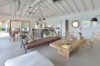 Bright open-plan living room with vaulted ceiling at Villa Plumbago, Colombier, St Barts villa rentals.