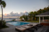 Twilight view of the pool and sun loungers at Villa Plumbago, Colombier, St Barts villa rental