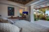Bedroom with terrace access and garden view at Villa Plumbago, st barts villa rental