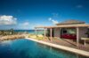 Infinity pool beside sun deck and lounge pavilion overlooking the Caribbean Sea at Villa Plumbago, st barts villa rental