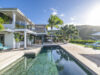 St barts villa rentals with private pool, palm trees, and ocean view from modern terrace