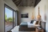 Serene bedroom with ocean view and natural light at private villa rentals st barths