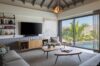 Contemporary living room with pool view and natural light at luxury villas st barts