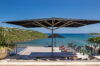 Expansive terrace with sun loungers and ocean view at luxury st barts villa rental.