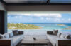 Open-air living area with ocean-view infinity pool and minimalist lounge seating at a luxury villa in St Barts.