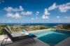 Infinity pool overlooking the Caribbean Sea and hillside views from a luxury villa in St Barts